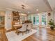 Elegant dining room with hardwood floors, chandelier, and access to outdoor views at 5951 Johnson Rd, Clover, SC 29710