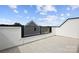 Exterior terrace offers a private outdoor space with stylish black railing at 6005 Countess Dr # 49, Charlotte, NC 28217