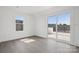 Light-filled bedroom with a modern window and sliding glass door at 6005 Countess Dr # 49, Charlotte, NC 28217