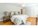 Bedroom featuring hardwood floors, ceiling fan, neutral decor, and ample natural light at 6338 Rosecrest Dr, Charlotte, NC 28210