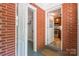 Entry way featuring a mud mat, and an adjoining laundry room and kitchen at 6338 Rosecrest Dr, Charlotte, NC 28210
