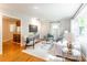 Bright living room with hardwood floors, natural light, and modern decor at 6338 Rosecrest Dr, Charlotte, NC 28210