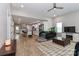 Bright, open-concept living area flows into a modern kitchen with stainless steel appliances at 703 S Main St, Landis, NC 28088