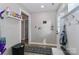 Mud room features storage bench, hooks, and decorative elements, creating a welcoming and functional space at 703 S Main St, Landis, NC 28088