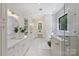 Spacious bathroom featuring double vanity, walk-in shower, soaking tub, and modern fixtures at 7768 Lynwood Ln, Sherrills Ford, NC 28673
