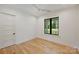 Neutral bedroom with natural light and wood floor at 7768 Lynwood Ln, Sherrills Ford, NC 28673