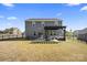 Expansive backyard with a pergola-covered patio, offering ample space for relaxation and outdoor activities at 8901 Powder Works Dr, Huntersville, NC 28078