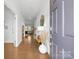 Inviting foyer showcases gleaming hardwood floors, and an open floor plan, creating a warm and welcoming ambiance at 8901 Powder Works Dr, Huntersville, NC 28078