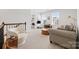 Cozy living space with neutral carpet, comfortable seating, and natural light at 8901 Powder Works Dr, Huntersville, NC 28078