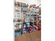 Organized walk-in pantry with ample shelving for storage and a variety of food items at 8901 Powder Works Dr, Huntersville, NC 28078