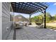 Charming backyard patio featuring an egg chair, fire pit, and stylish outdoor seating at 8901 Powder Works Dr, Huntersville, NC 28078