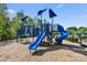 Community playground featuring colorful slides and play structures for children at 8901 Powder Works Dr, Huntersville, NC 28078