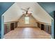 Spacious tiled room with built-in cabinets and a bright window at 8902 Whittingham Dr, Waxhaw, NC 28173