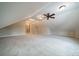 Spacious carpeted bonus room with ample lighting, perfect for Gathering activities or a game room at 8902 Whittingham Dr, Waxhaw, NC 28173