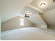 Bright, open bonus room with natural light and neutral colors, offering versatile space at 8902 Whittingham Dr, Waxhaw, NC 28173