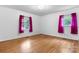 Bedroom featuring hardwood floors, natural light, and a serene ambiance at 8903 Larchmont Cir, Charlotte, NC 28214