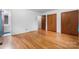 Bedroom with hardwood floors, closet space, and neutral color palette at 8903 Larchmont Cir, Charlotte, NC 28214