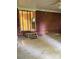 Enclosed patio has a brick wall and slider, connecting indoor and outdoor spaces at 918 Carmel Dr, Gastonia, NC 28056