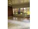 Cozy sunroom with plenty of natural light and views of the backyard at 918 Carmel Dr, Gastonia, NC 28056