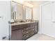 Bright bathroom features double sinks, granite counters, and modern fixtures at 924 Forbes Rd, Fort Mill, SC 29707