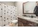 Bathroom featuring a granite countertop and a shower with a decorative curtain at 924 Forbes Rd, Fort Mill, SC 29707