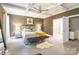 Spacious bedroom boasts tray ceilings, soft carpet, and large windows allowing natural light at 924 Forbes Rd, Fort Mill, SC 29707