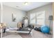 Bright exercise room with pilates machine, dresser, and natural light at 924 Forbes Rd, Fort Mill, SC 29707