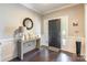 Welcoming foyer with dark hardwood floors and a stylish entryway table at 924 Forbes Rd, Fort Mill, SC 29707