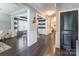 Hallway with hardwood floors, neutral paint, and decorative touches at 924 Forbes Rd, Fort Mill, SC 29707