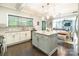 Spacious kitchen with a center island, stainless steel appliances, granite countertops, and dark hardwood floors at 924 Forbes Rd, Fort Mill, SC 29707