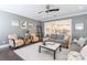 Chic living room open to the kitchen features comfortable seating, stylish decor, and a welcoming atmosphere at 924 Forbes Rd, Fort Mill, SC 29707