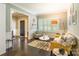 Inviting living room with hardwood floors, stylish seating, and ample natural light at 924 Forbes Rd, Fort Mill, SC 29707