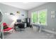 Bright home office with dual desks, modern decor, and comfortable seating at 924 Forbes Rd, Fort Mill, SC 29707