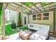 Relaxing backyard patio with pergola, string lights, comfortable seating, and a modern fire pit at 924 Forbes Rd, Fort Mill, SC 29707