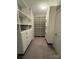 Spacious walk-in closet with built-in shelving, drawers, and ample storage space at 924 Forbes Rd, Fort Mill, SC 29707