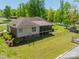 A home with a fenced backyard, screened-in deck, and a storage shed at 1005 Spring Rock Dr, Salisbury, NC 28146