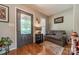 Inviting entryway with decorative glass door, hardwood floors, and cozy seating nook at 1005 Spring Rock Dr, Salisbury, NC 28146