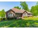 All brick home with covered front porch and manicured lawn at 1005 Spring Rock Dr, Salisbury, NC 28146