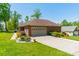 Brick home with two car garage and mature landscaping at 1005 Spring Rock Dr, Salisbury, NC 28146