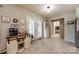 Spacious kitchen with a coffee bar, tile flooring, access to the laundry room and outdoor patio at 1005 Spring Rock Dr, Salisbury, NC 28146