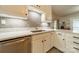 Bright kitchen features modern stainless steel appliances, stylish subway tile backsplash, and white cabinets at 1005 Spring Rock Dr, Salisbury, NC 28146