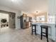 Bright kitchen features stainless steel appliances, granite countertops, and bar seating area at 1005 Spring Rock Dr, Salisbury, NC 28146