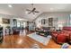 Bright living room featuring hardwood floors, vaulted ceiling, and comfortable seating arrangements at 1005 Spring Rock Dr, Salisbury, NC 28146