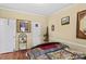 A bedroom with animal print decor, including wall art, bedding, and decorative items at 114 Doubletree Dr, Statesville, NC 28677