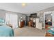 A cozy bedroom with a desk and dresser, offering space for relaxation and work at 114 Doubletree Dr, Statesville, NC 28677