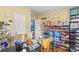 Colorful craft room with crafting supplies, shelves, and polka dots on the wall at 114 Doubletree Dr, Statesville, NC 28677