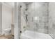 Well-lit bathroom featuring a tiled shower, modern fixtures, and a clear glass enclosure for a spa-like experience at 127 N Tryon St # 511, Charlotte, NC 28202