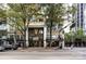 Street view of hotel residences showing the main entrance and a canopy in an urban setting at 127 N Tryon St # 511, Charlotte, NC 28202