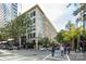 Attractive multi-story building exterior showing streetscape with sidewalks and street crossings in an urban setting at 127 N Tryon St # 511, Charlotte, NC 28202