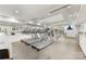 Modern gym with treadmills, weight machines, TV, and plenty of space to workout at 127 N Tryon St # 511, Charlotte, NC 28202